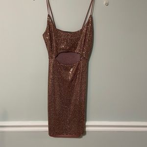 Dark champagne/gold shiny dress. Size medium. Center cutout